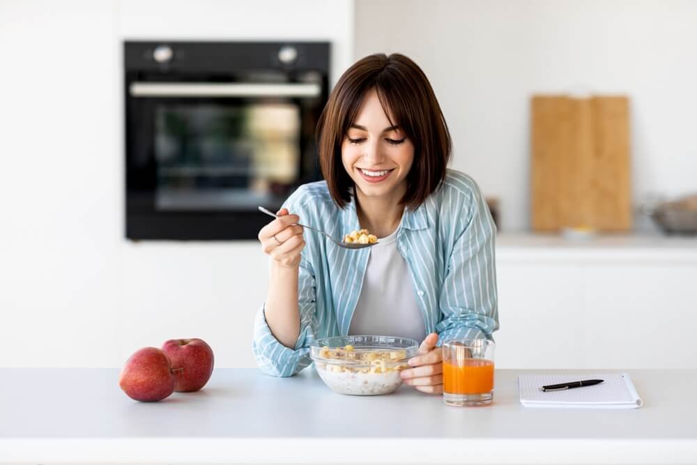 A picture of a cereal and milk breakfast