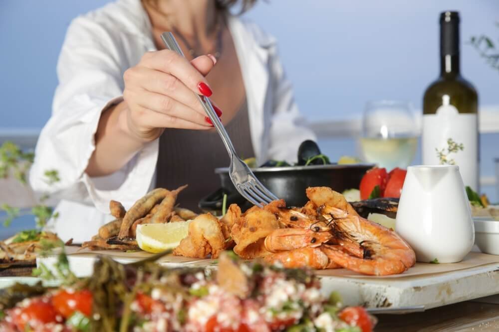 a woman eating a Mediterranean diet