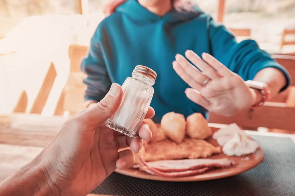 a picture of someone refusing salt
